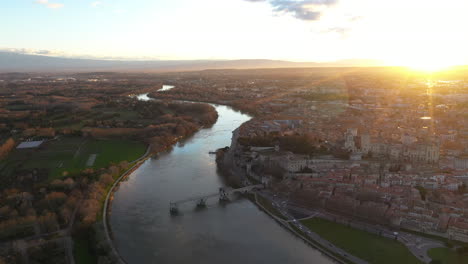 Rhone-river-aerial-sunrise-over-Avignon-historical-center-pont-saint-bénézet